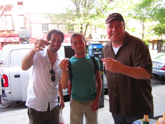 Sharing an Arthur Avenue clam with Nino and Johnny